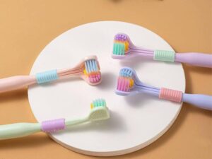 three way tooth brush pastel colors